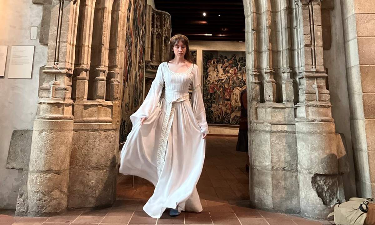 woman wearing a white renaissance dress