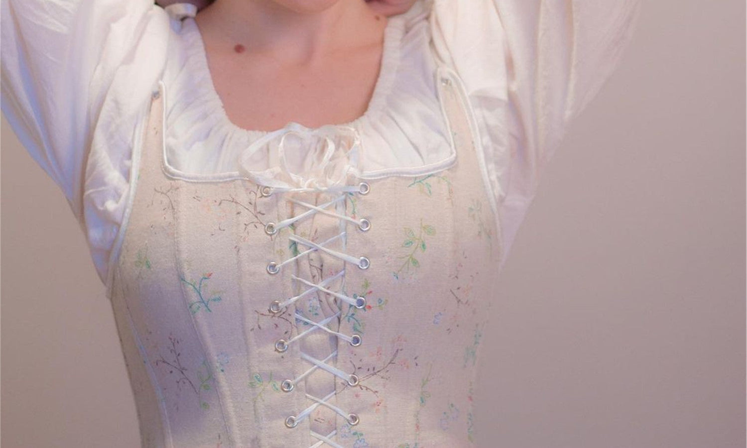 woman wearing a corset with flower print