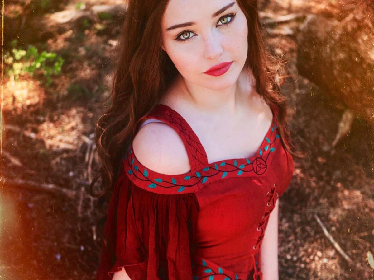 woman wearing a beautiful red renaissance dress