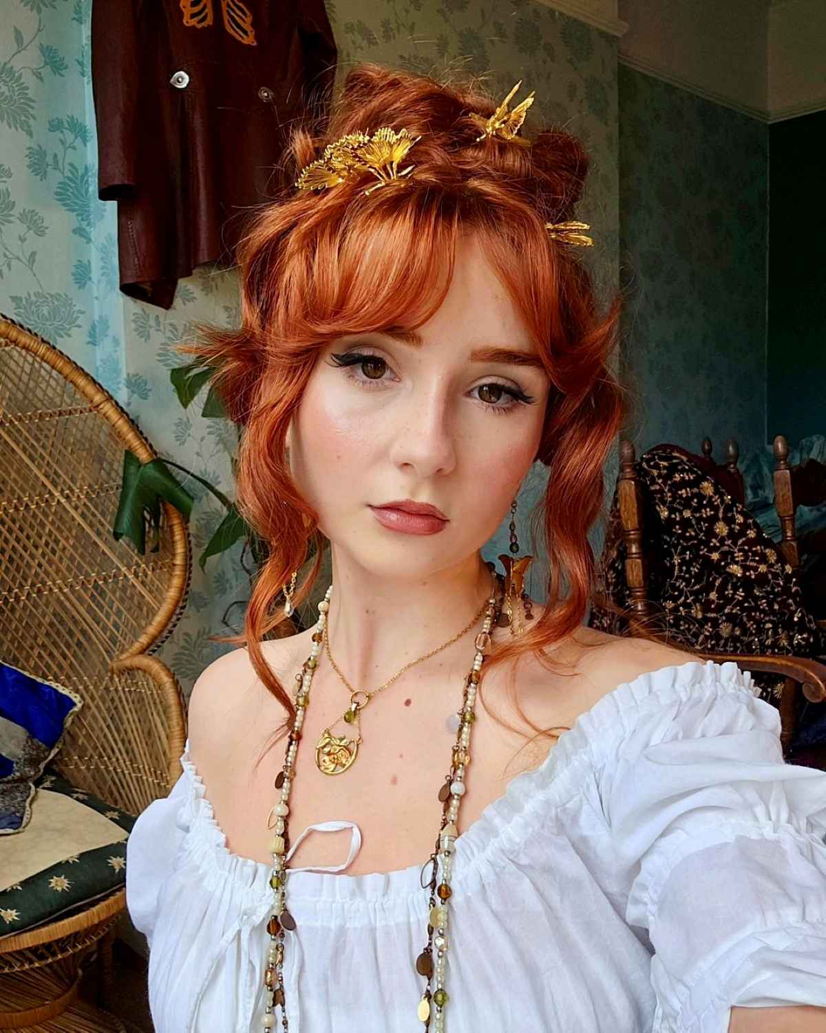 beautiful woman with red hair wearing a white dress